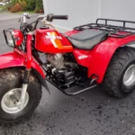 Discover the ATC200M, Honda’s compact utility 3-wheeler featuring a 182cc 4-stroke engine, 5-speed auto-clutch transmission, and rugged design.
