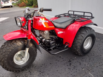 Discover the ATC200M, Honda’s compact utility 3-wheeler featuring a 182cc 4-stroke engine, 5-speed auto-clutch transmission, and rugged design.