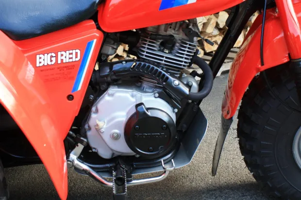 Discover the ATC200ES Big Red, Honda’s iconic utility 3-wheeler featuring electric start, 182cc 4-stroke engine, and rugged farm-ready design.