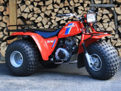 Discover the ATC200ES Big Red, Honda’s iconic utility 3-wheeler featuring electric start, 182cc 4-stroke engine, and rugged farm-ready design.