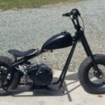 Discover the RCF Bobber, a hand-built mini bike featuring bobber styling, 212cc engine, and custom craftsmanship. Ride vintage vibes in a compact package.