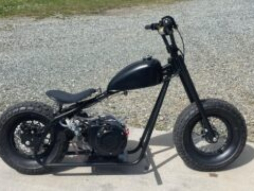 Discover the RCF Bobber, a hand-built mini bike featuring bobber styling, 212cc engine, and custom craftsmanship. Ride vintage vibes in a compact package.