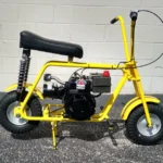 The yellow stock mini bike delivers high-visibility styling with dependable factory performance. Explore engine specs, ride quality, durability.