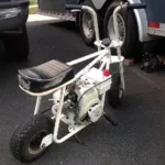 The Great White 100 mini bike delivers powerful 100cc performance with bold styling and rugged durability. Explore engine specs, ride quality, handling.