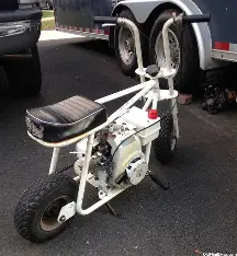 The Great White 100 mini bike delivers powerful 100cc performance with bold styling and rugged durability. Explore engine specs, ride quality, handling.