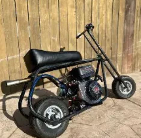 The Black J-Bar stock minibike delivers reliable performance, rugged design, and classic minibike styling. Learn about engine specs, features, riding