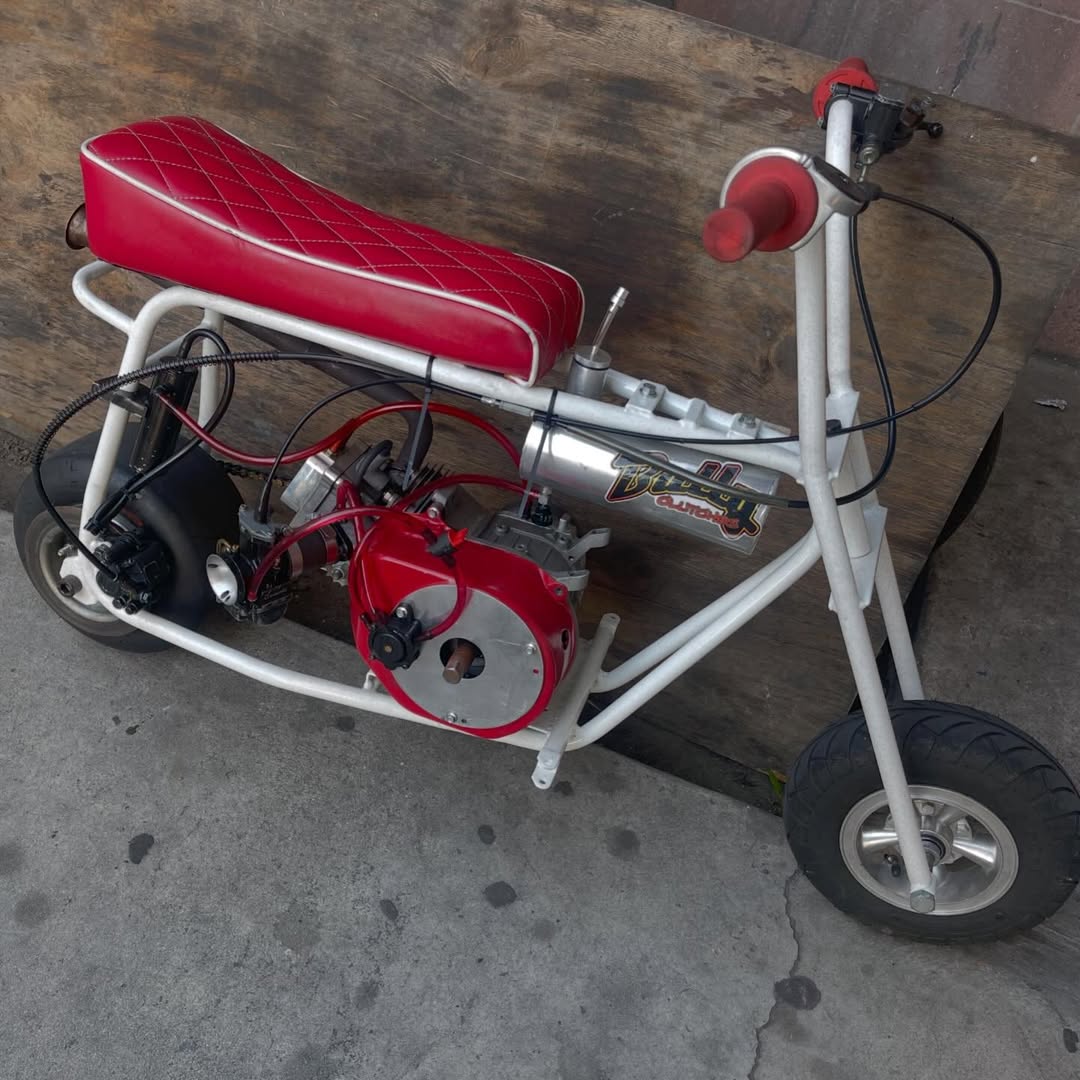 The dark red stock minibike blends deep, rich color styling with reliable factory performance. Explore engine specs, ride quality, durability